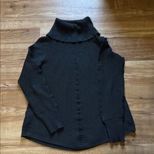 Cyrus sweater size medium.